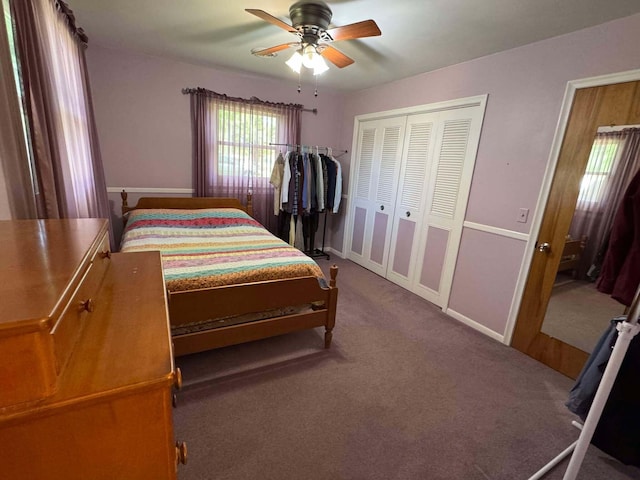bedroom featuring a closet, carpet, a ceiling fan, and baseboards