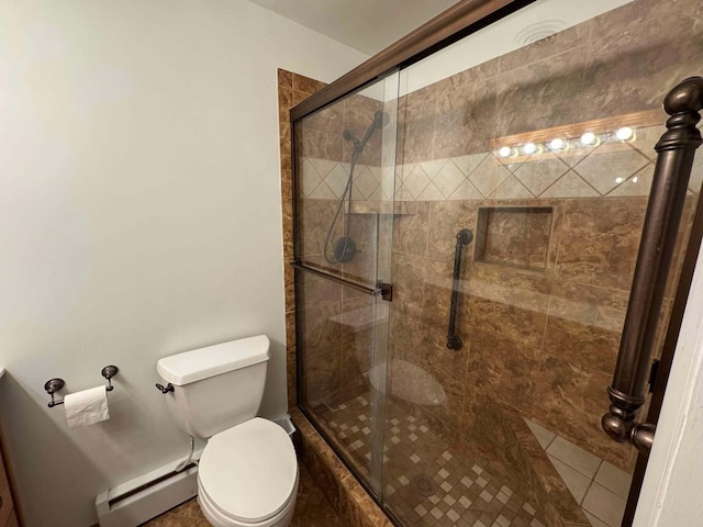 full bathroom featuring baseboard heating, a stall shower, and toilet