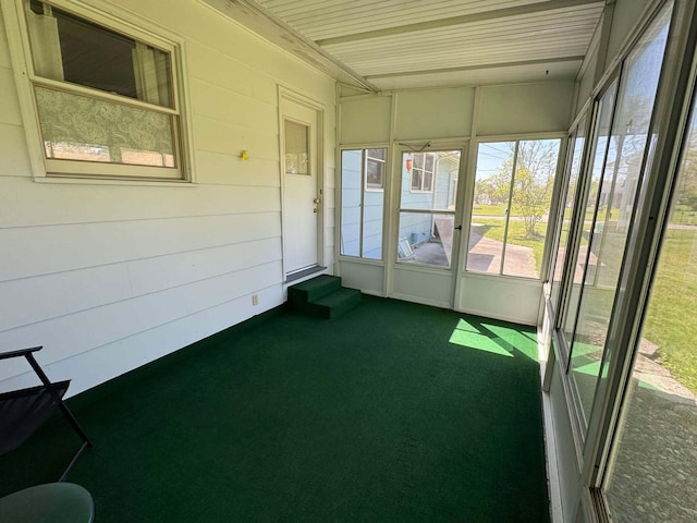 unfurnished sunroom featuring entry steps