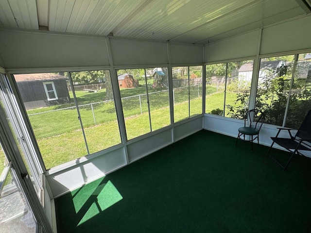 unfurnished sunroom featuring healthy amount of natural light