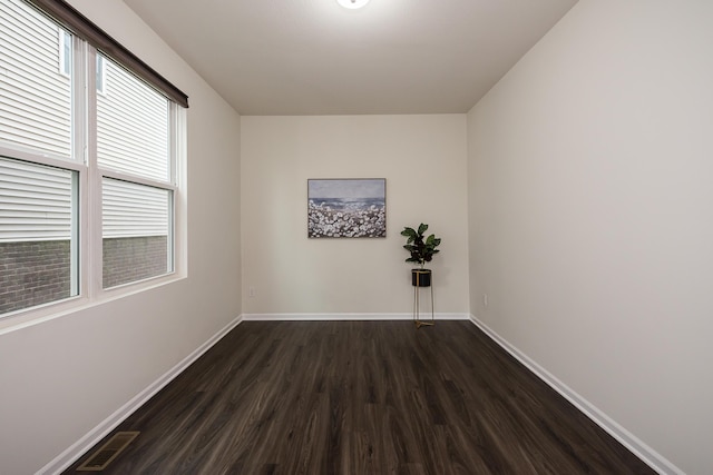 2767 St Regis Way, Ann Arbor, MI 48105 - empty room with dark wood-style flooring and baseboards