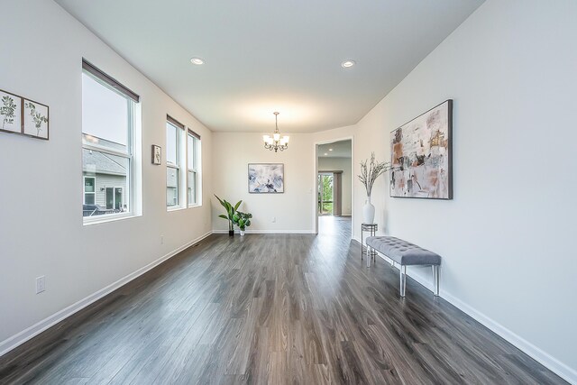 2767 St Regis Way, Ann Arbor, MI 48105 - unfurnished dining area with a chandelier, dark wood finished floors, baseboards, and recessed lighting