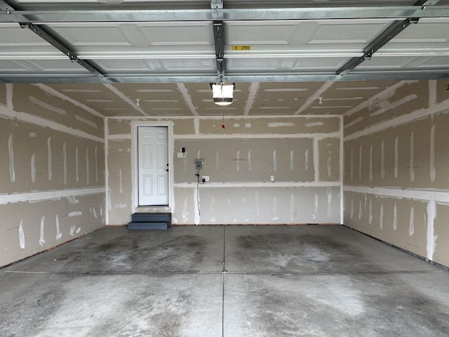 2767 St Regis Way, Ann Arbor, MI 48105 - garage with a garage door opener
