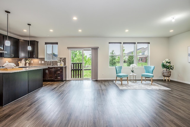 2767 St Regis Way, Ann Arbor, MI 48105 - kitchen with dark wood-style flooring, baseboards, dark brown cabinets, tasteful backsplash, and recessed lighting
