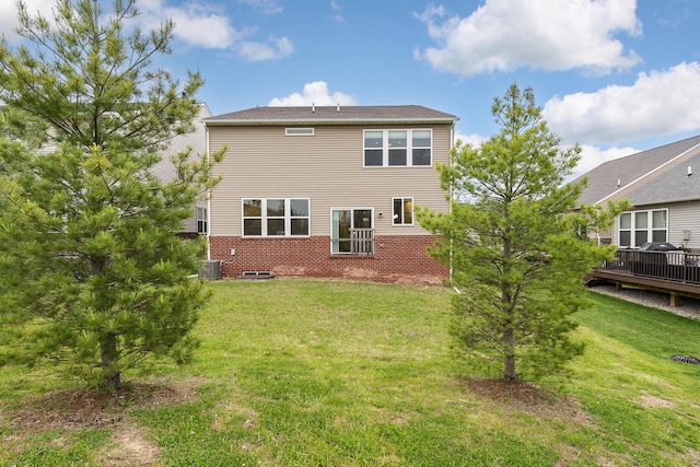 2767 St Regis Way, Ann Arbor, MI 48105 - back of property featuring a yard, brick siding, central air condition unit, and a wooden deck
