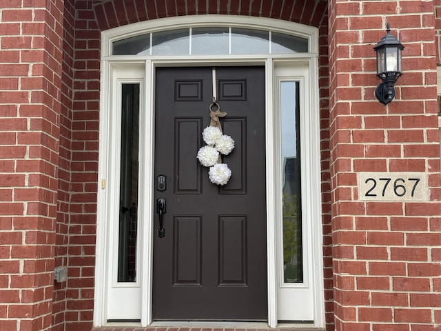 2767 St Regis Way, Ann Arbor, MI 48105 - view of exterior entry featuring brick siding