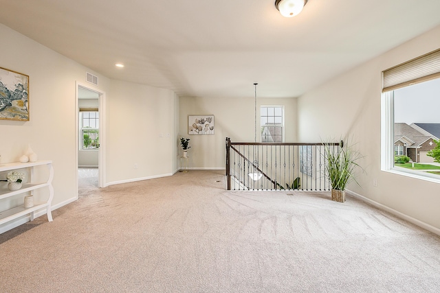2767 St Regis Way, Ann Arbor, MI 48105 - empty room with carpet flooring, healthy amount of natural light, baseboards, and recessed lighting