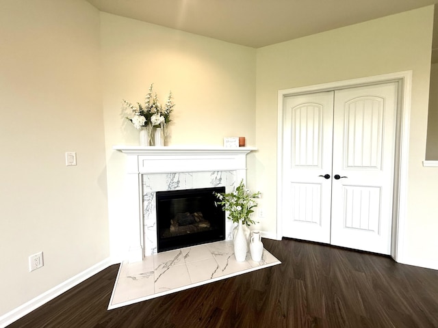 2767 St Regis Way, Ann Arbor, MI 48105 - detailed view of wood finished floors, a fireplace, and baseboards