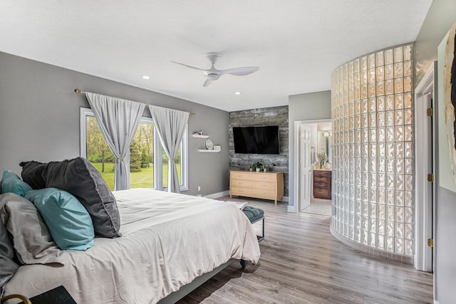 bedroom with wood finished floors, baseboards, ceiling fan, recessed lighting, and access to exterior