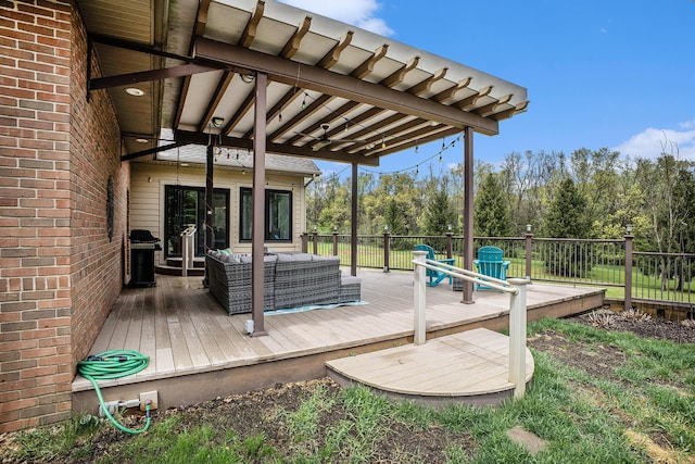 deck with an outdoor hangout area and a grill