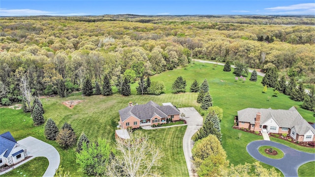 drone / aerial view of a heavily wooded area