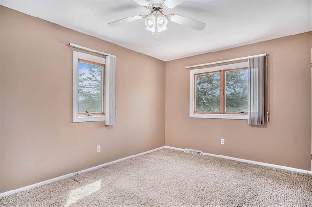 11630 Myers Lake Ave NE, Cedar Springs, MI 49319 - carpeted empty room with ceiling fan and baseboards
