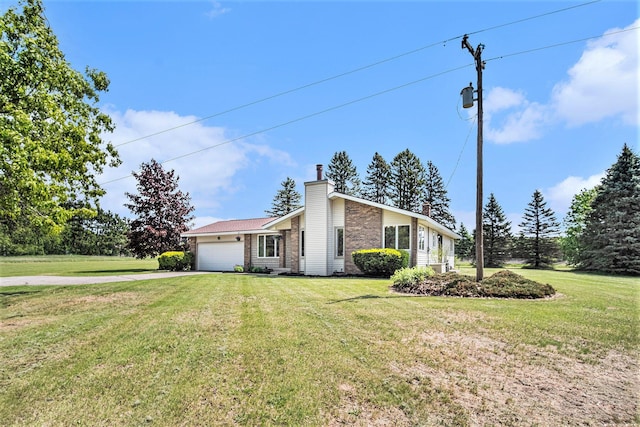 11630 Myers Lake Ave NE, Cedar Springs, MI 49319 - mid-century inspired home with a chimney, asphalt driveway, a front yard, and an attached garage