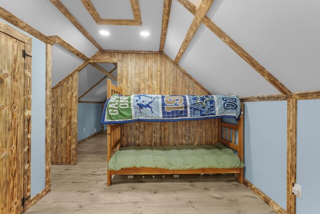 23748 Cutler Rd, Newaygo, MI 49337 - additional living space with lofted ceiling, wooden walls, wood finished floors, and recessed lighting