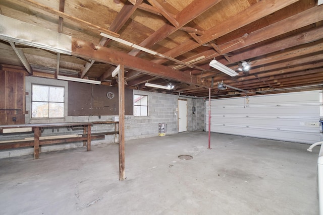 923 Maple St, Ludington, MI 49431 - garage featuring a garage door opener