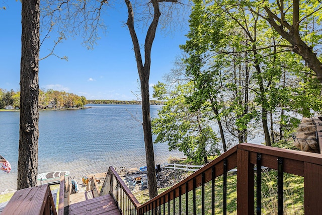 deck featuring a water view
