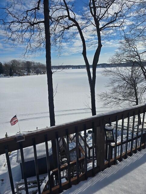 view of snow covered deck