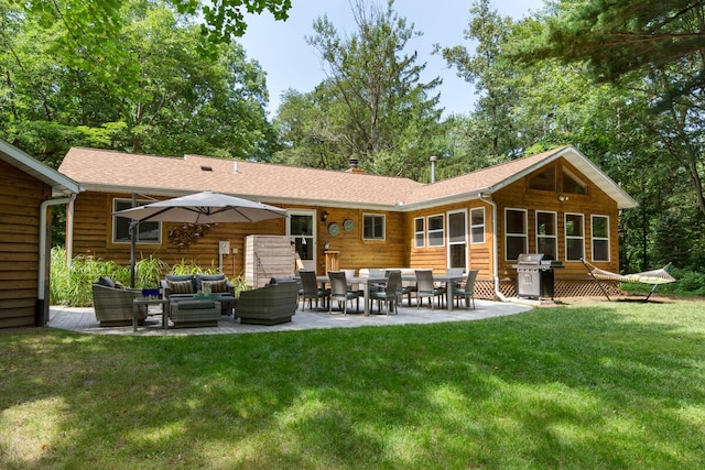 6490 E Chikaming, Sawyer, MI 49125 - back of house with outdoor lounge area, a patio area, a lawn, a shingled roof, and a chimney