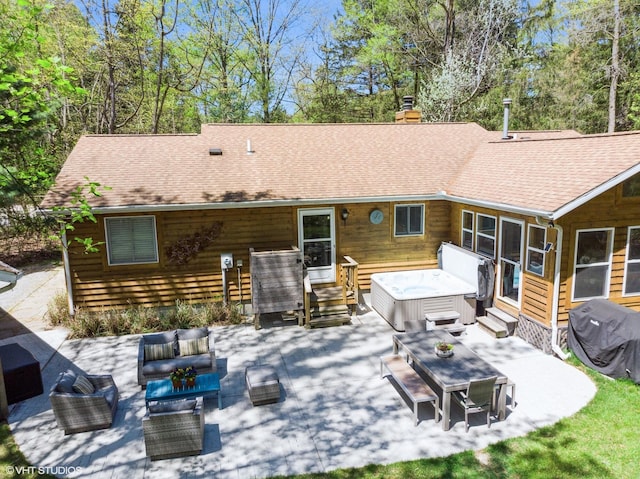 6490 E Chikaming, Sawyer, MI 49125 - back of property featuring entry steps, an outdoor hangout area, a patio area, and a chimney