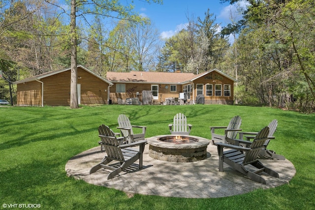6490 E Chikaming, Sawyer, MI 49125 - rear view of house featuring a fire pit, a yard, and a patio
