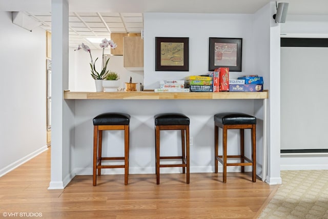 6490 E Chikaming, Sawyer, MI 49125 - bar area featuring wood finished floors and baseboards