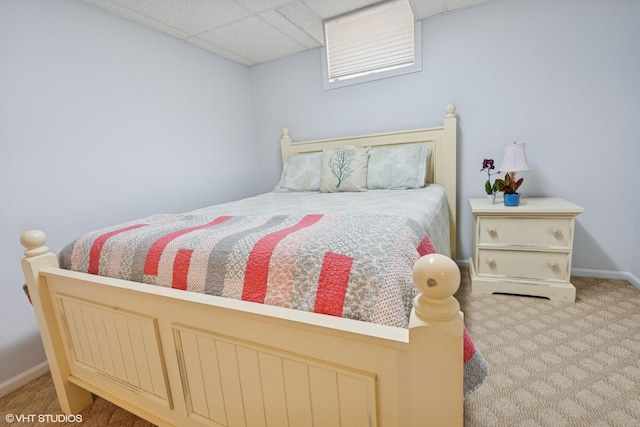 6490 E Chikaming, Sawyer, MI 49125 - carpeted bedroom featuring a paneled ceiling and baseboards