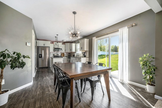 5790 Paxton Ct, Portage, MI 49024 - dining space with baseboards, dark wood-style flooring, and a chandelier