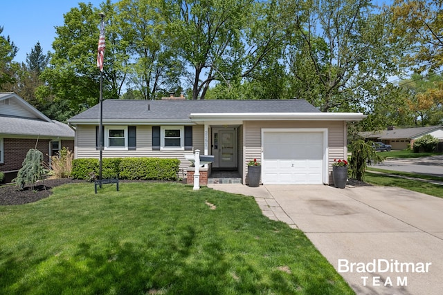 2151 Anderson Dr SE, Grand Rapids, MI 49506 - view of front facade with an attached garage, concrete driveway, and a front lawn
