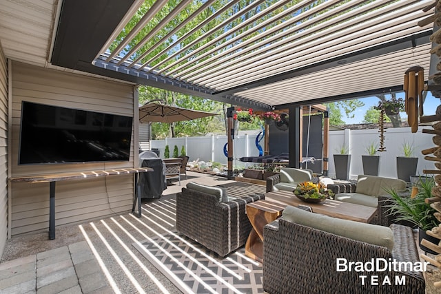 2151 Anderson Dr SE, Grand Rapids, MI 49506 - view of patio featuring an outdoor living space and a fenced backyard