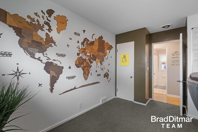 2151 Anderson Dr SE, Grand Rapids, MI 49506 - carpeted entrance foyer featuring baseboards