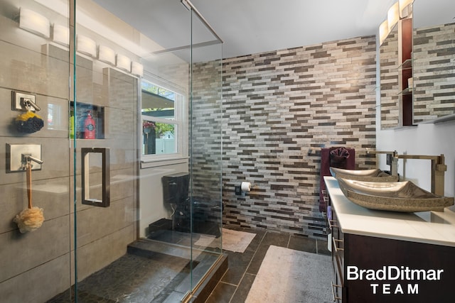 2151 Anderson Dr SE, Grand Rapids, MI 49506 - bathroom with tile patterned flooring, a shower stall, and vanity