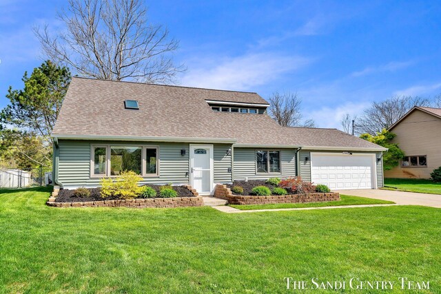 17083 Spahr St, Spring Lake, MI 49456 - view of front of home with a garage, a shingled roof, and concrete driveway