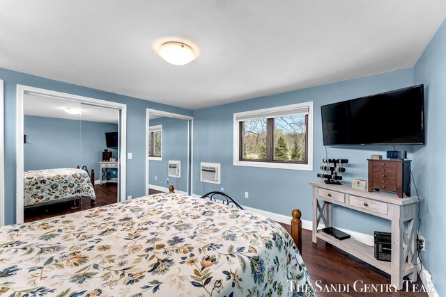 17083 Spahr St, Spring Lake, MI 49456 - bedroom featuring dark wood-type flooring and baseboards