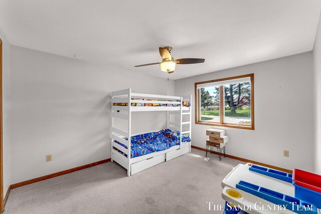 17083 Spahr St, Spring Lake, MI 49456 - bedroom featuring baseboards, carpet flooring, and ceiling fan