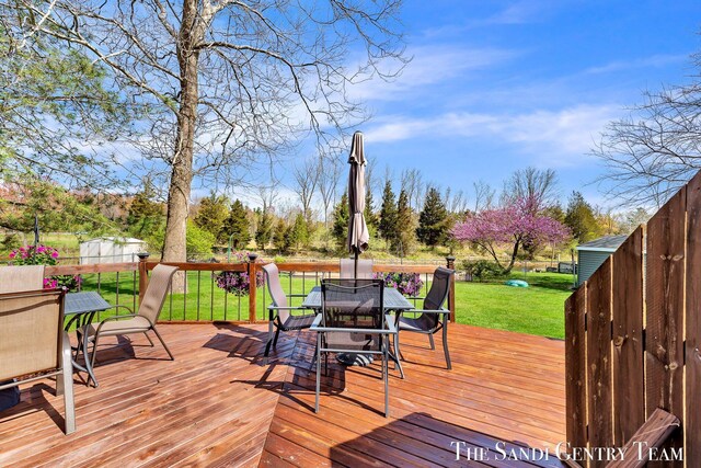 17083 Spahr St, Spring Lake, MI 49456 - wooden terrace with outdoor dining area