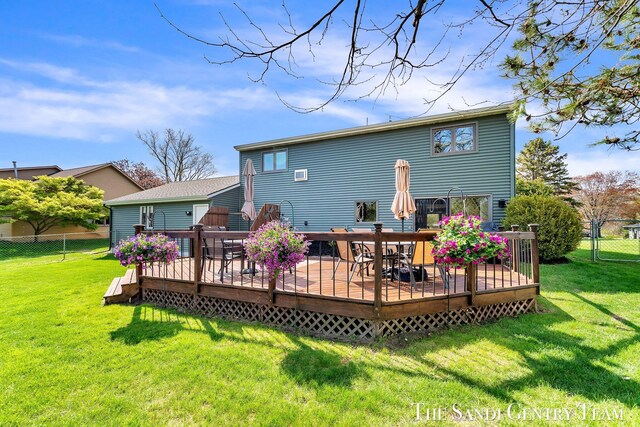17083 Spahr St, Spring Lake, MI 49456 - rear view of house featuring outdoor dining area and a deck