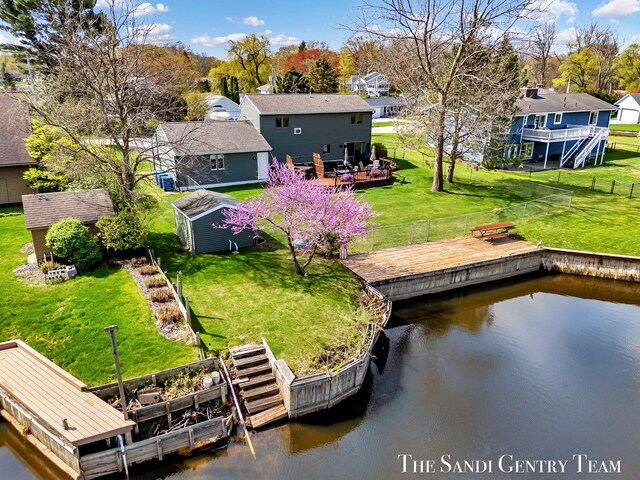 17083 Spahr St, Spring Lake, MI 49456 - dock area featuring a residential view and a deck with water view