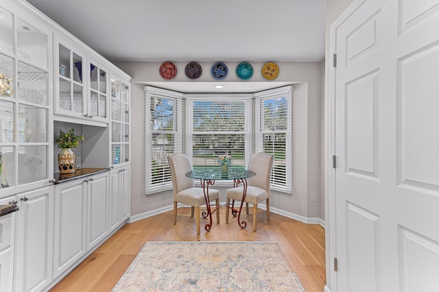 2485 Wildbrook Run Unit 154, Bloomfield Hills, MI 48304 - dining space with baseboards and light wood-style flooring