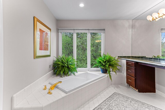 2485 Wildbrook Run Unit 154, Bloomfield Hills, MI 48304 - bathroom featuring vanity, healthy amount of natural light, a garden tub, tile patterned flooring, and recessed lighting