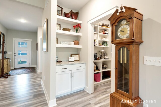 4700 Albright Ct SW Unit 6, Wyoming, MI 49418 - hall featuring light wood-style flooring and baseboards