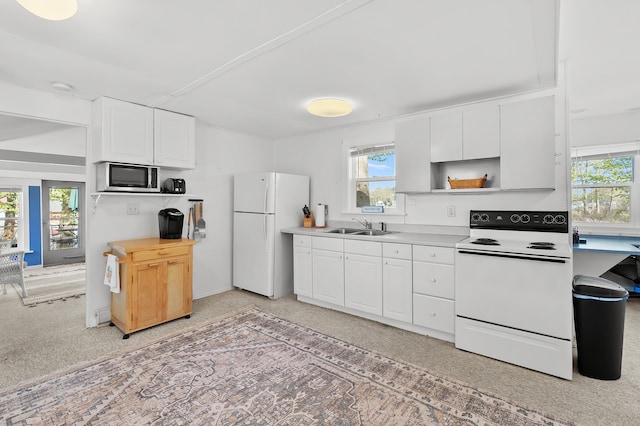1098210976 Beech Is, Plainwell, MI 49080 - kitchen with white appliances, a sink, white cabinetry, light countertops, and open shelves