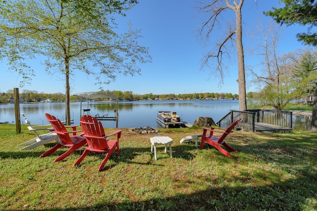 1098210976 Beech Is, Plainwell, MI 49080 - dock area with a water view and a lawn