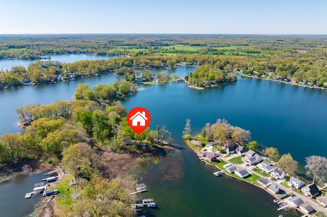 1098210976 Beech Is, Plainwell, MI 49080 - view of property location with a heavily wooded area and a large body of water