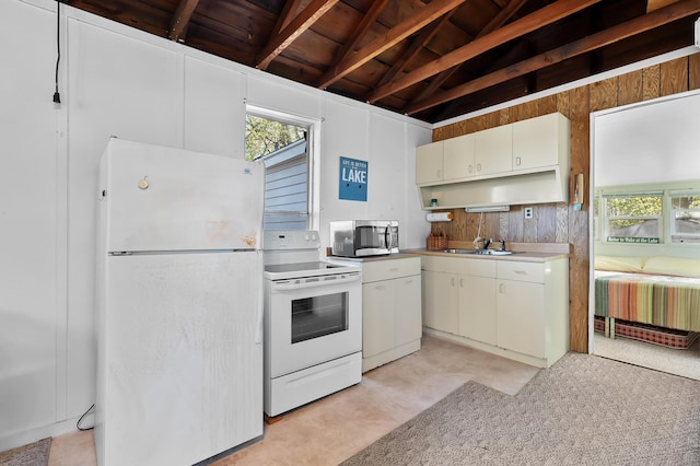 1098210976 Beech Is, Plainwell, MI 49080 - kitchen with white appliances, wood ceiling, open shelves, white cabinets, and light countertops