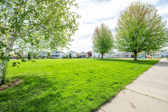 405 Anchors Way, Saint Joseph, MI 49085 - view of grassy yard with a residential view