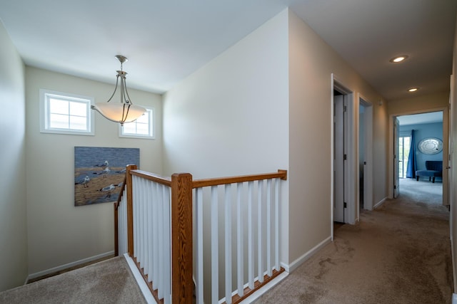 405 Anchors Way, Saint Joseph, MI 49085 - hall with an upstairs landing, carpet, baseboards, and recessed lighting