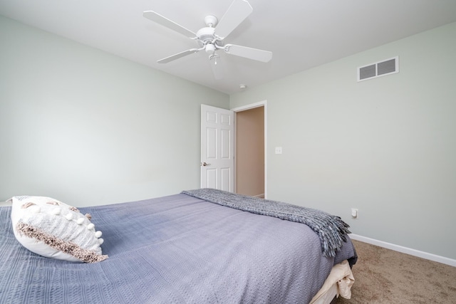 405 Anchors Way, Saint Joseph, MI 49085 - bedroom featuring carpet, baseboards, and a ceiling fan