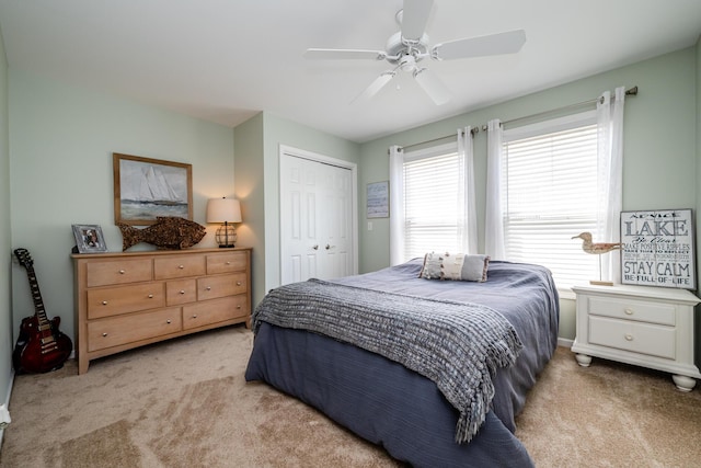 405 Anchors Way, Saint Joseph, MI 49085 - carpeted bedroom featuring a closet and ceiling fan