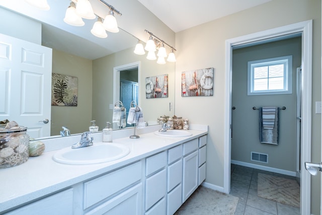 405 Anchors Way, Saint Joseph, MI 49085 - bathroom with double vanity, tile patterned flooring, and baseboards