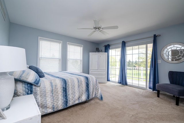 405 Anchors Way, Saint Joseph, MI 49085 - bedroom with access to exterior, carpet, and a ceiling fan